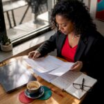 Compliance officer reviewing KYC audit documents
