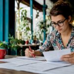 QA manager reviewing language quality assurance documents